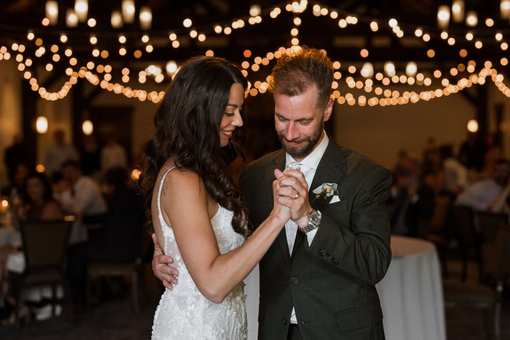 couple having their first dance silvertip resort canmore
