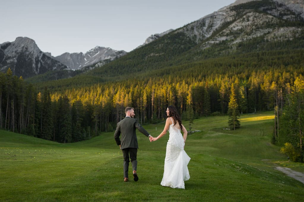 couple on silvertip golf course during golden hour
