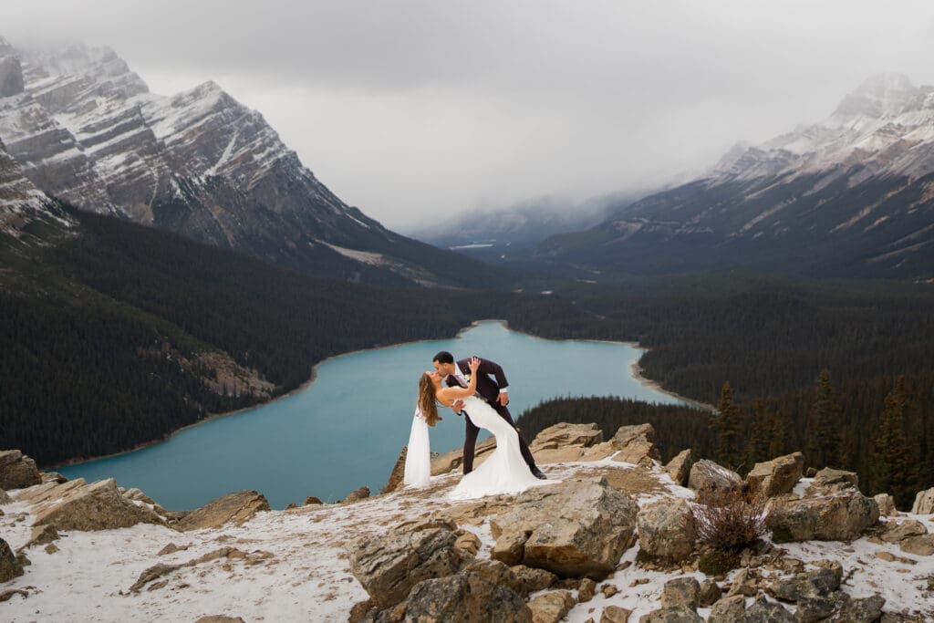 Couple kissing after elopement at Peyto Lake in Banff