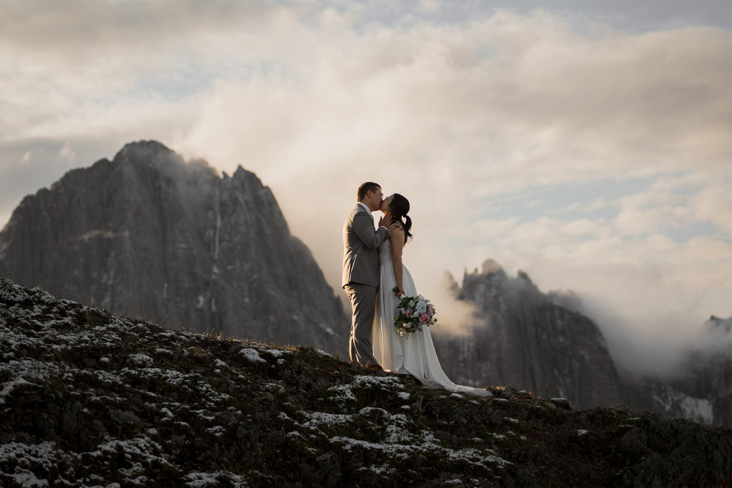 Couple kissing, Kananaskis hiking elopement